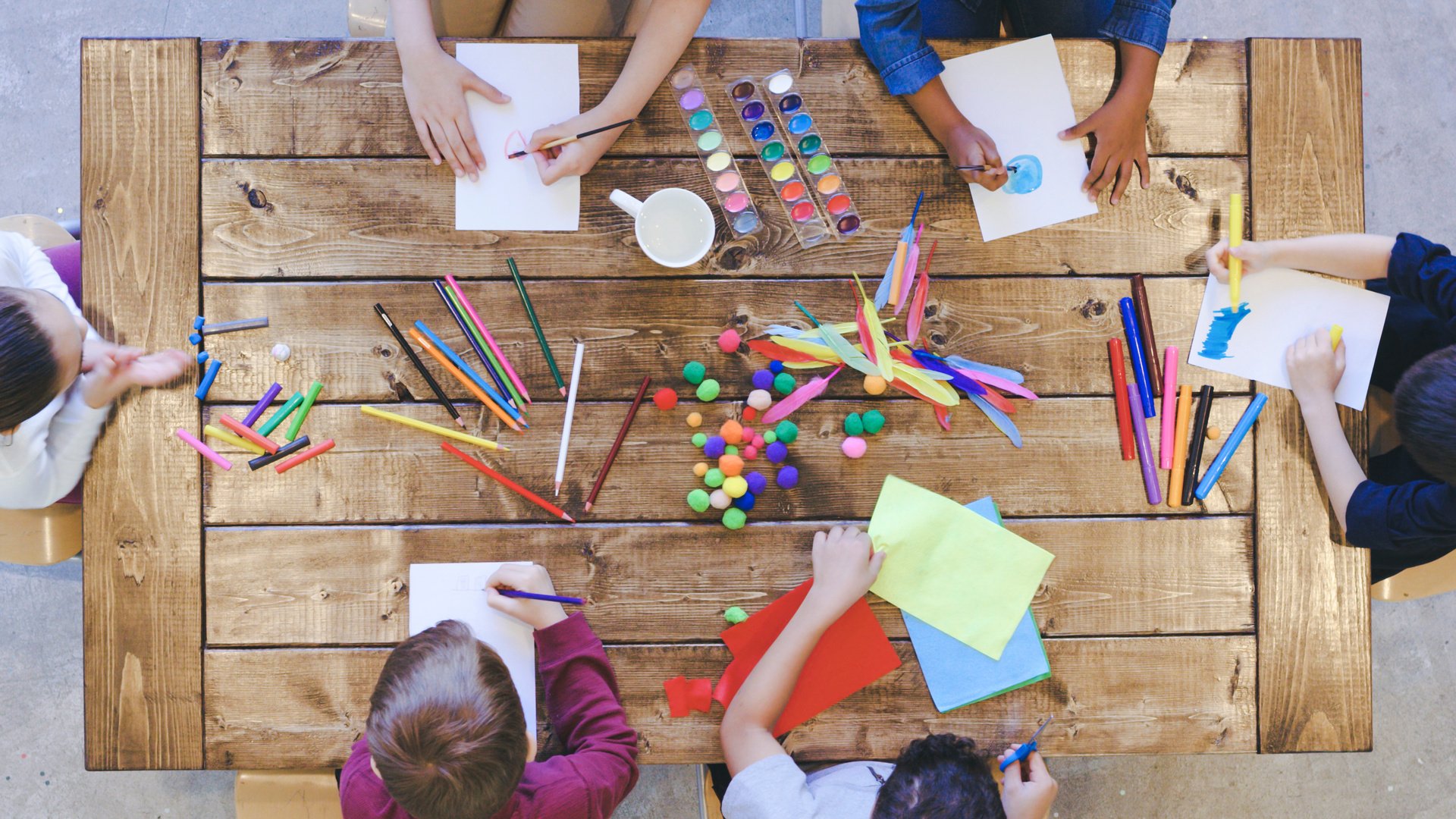 Aerial view of kids doing arts and crafts